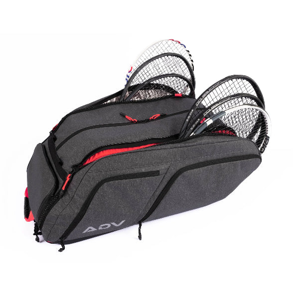 Tennis racket backpack in charcoal gray with multiple padded compartments, shown holding several rackets securely, designed for competitive players needing organized storage for gear and accessories.