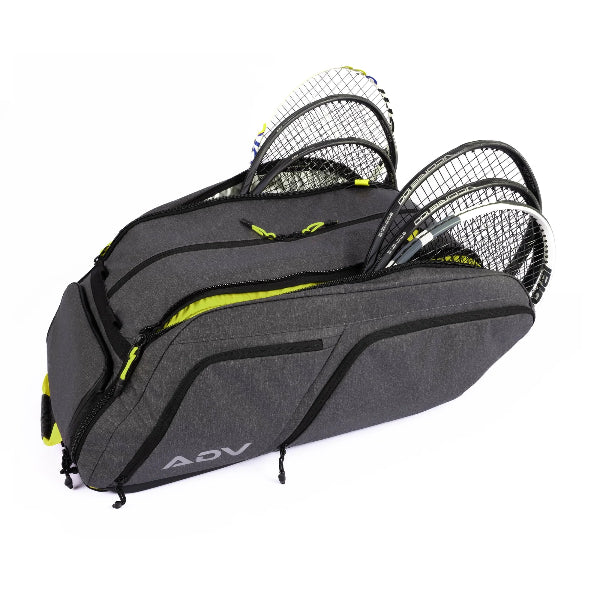Tennis racquet backpack with multiple compartments holding several racquets, shown open on a white background.