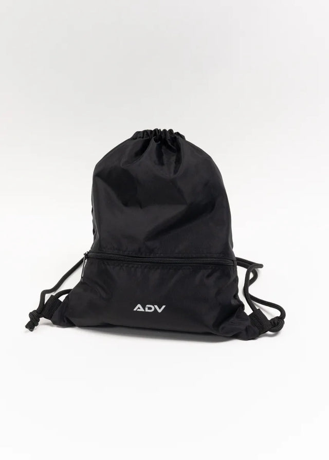 Black ADV Dash drawstring bag with front zip pocket on white background.