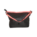 ADV accessory pouch in black with coral strap shown open from above with snap button closure.