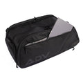 Black tennis backpack with a side zippered pocket partially open to reveal a silver laptop inside.