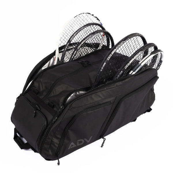 6 racket tennis backpack with two large compartments unzipped to reveal multiple racquets neatly stored inside.