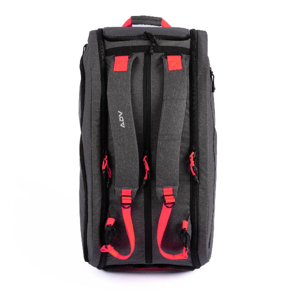Black tennis tournament backpack with padded straps and red accents designed for carrying multiple rackets and gear.