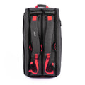 Black tennis tournament backpack with padded straps and red accents designed for carrying multiple rackets and gear.