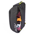 Black tennis backpack with side laundry compartment, shown storing multiple colorful clothing items for post-match convenience.