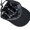 Interior view of black ADVantage tennis cap showing branded sweatband and perforated mesh venting.