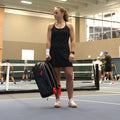 Pickleball Backpack V2 lifestyle photo with player