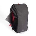 Gray pickleball bag with a laptop compartment, featuring red interior accents and a sleek, versatile design.