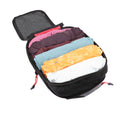 Open ADV medium packing cube filled with rolled clothing, showing mesh panel and red zipper pulls.