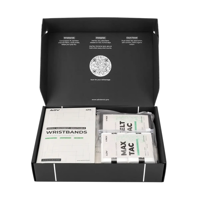 Open ADV tennis starter kit box containing wristbands, MaxTac overgrips, and a court towel with product descriptions on the lid.
