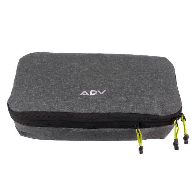 Charcoal grey ADV medium packing cube with black zippers and volt green pulls.