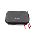 Grey ADV packing cube with black YKK zippers and red pull cords, closed.