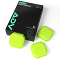Neon green ADV Touch tennis dampeners beside their black 3-pack box.