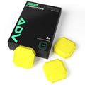 Yellow ADV Touch tennis dampeners, 3-pack, beside black retail box.