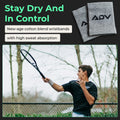 Grey ADV cotton blend tennis wristbands shown beside a player wearing one mid-swing.