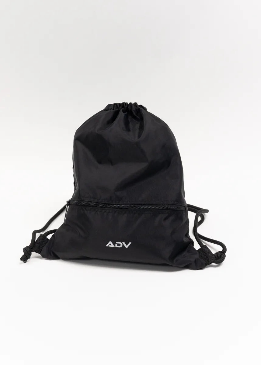 Black ADV Dash drawstring bag with front zip pocket on white background.