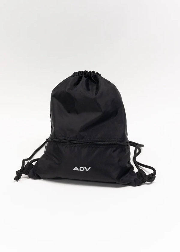 Black ADV Dash drawstring bag with front zip pocket on white background.