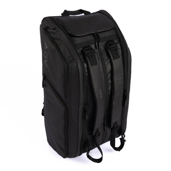 Black ADV Pro V3 tennis backpack with padded straps, top handle, and multiple zippered compartments.